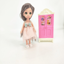 Picture of Annie's sweet doll with a wardrobe.